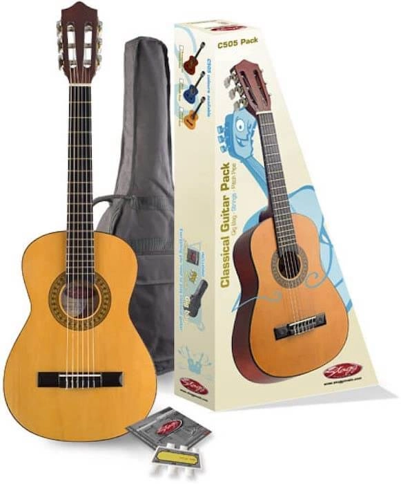 A 32" Stagg C505 Guitar, a cardboard box, a gig bag, and spare strings